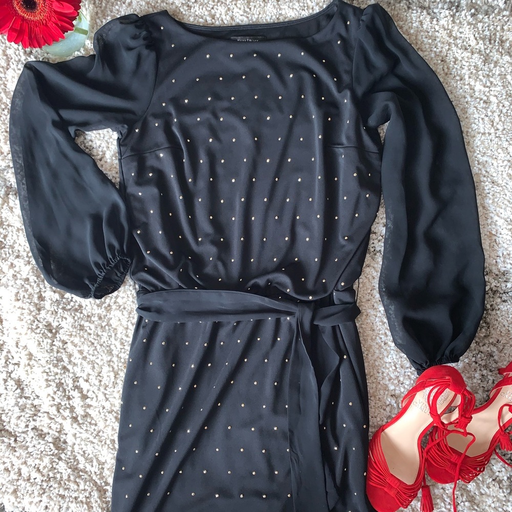 Elegant Black Dress with Subtle Embellishments